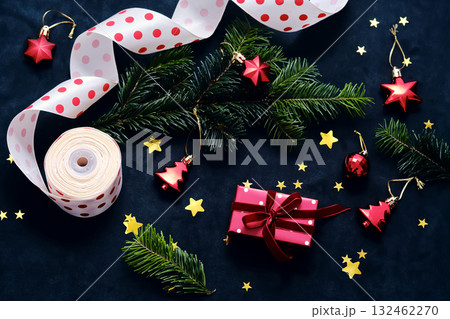 A New Year's or Christmas background with a gift wrapping theme. A New Year's or Christmas background with a gift wrapping theme. 132462270