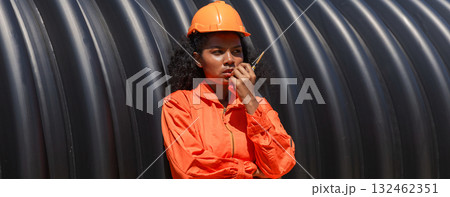 ndustry Engineers Walking Inside Circular water Pipe. Engineering or Worker inspection pipe  132462351