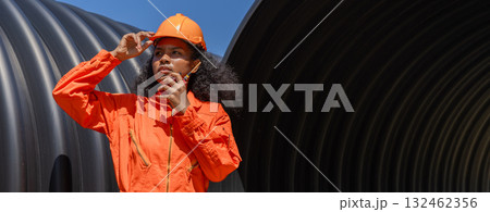 ndustry Engineers Walking Inside Circular water Pipe. Engineering or Worker inspection pipe ndustry Engineers Walking Inside Circular water Pipe. Engineering or Worker inspection pipe 132462356
