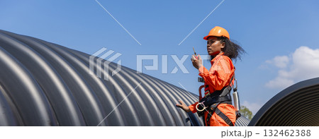 ndustry Engineers Walking Inside Circular water Pipe. Engineering or Worker inspection pipe  132462388