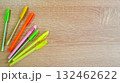 Colored pens lying on the table 132462622