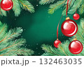 Red balls hanging on the branches of a Christmas tree green background 132463035