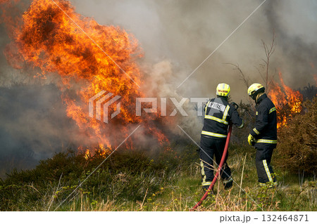 Wildfires fire burning with a lot of smoke, firefighters Wildfires fire burning with a lot of smoke, firefighters 132464871
