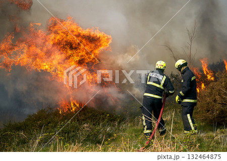 Wildfires fire burning with a lot of smoke, firefighters 132464875