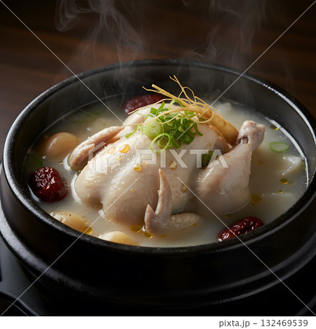 Steaming Samgyetang traditional Korean chicken ginseng soup Steaming Samgyetang traditional Korean chicken ginseng soup 132469539