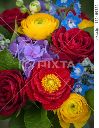 Vibrant bouquet of red yellow and purple flowers 132469582