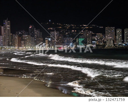 luminous skyline with diverse architecture reflected in tranquil waters during lively nocturnal 132471759