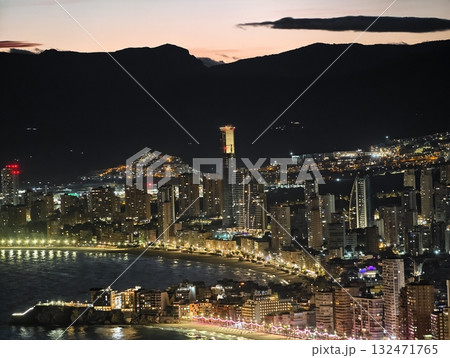 luminous skyline with diverse architecture reflected in tranquil waters during lively nocturnal luminous skyline with diverse architecture reflected in tranquil waters during lively nocturnal 132471765