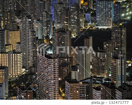 luminous skyline with diverse architecture reflected in tranquil waters during lively nocturnal luminous skyline with diverse architecture reflected in tranquil waters during lively nocturnal 132471777