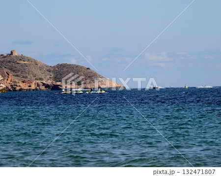 luminous skyline with diverse architecture reflected in tranquil waters during lively nocturnal 132471807