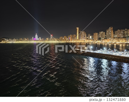 luminous skyline with diverse architecture reflected in tranquil waters during lively nocturnal luminous skyline with diverse architecture reflected in tranquil waters during lively nocturnal 132471880