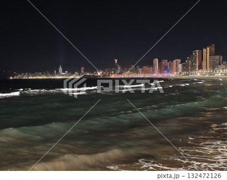 tempestuous waters clash with urban skyline, wild sea and storm clouds over bustling metropolitan tempestuous waters clash with urban skyline, wild sea and storm clouds over bustling metropolitan 132472126
