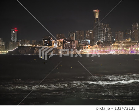 urban night reflections, silent harbor with shimmering lights, serene waterfront scene under evening 132472133