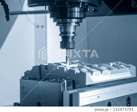 CNC milling machine processing on steel 132473791