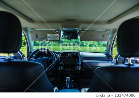 Interior of off road car in forest mountains 132474006