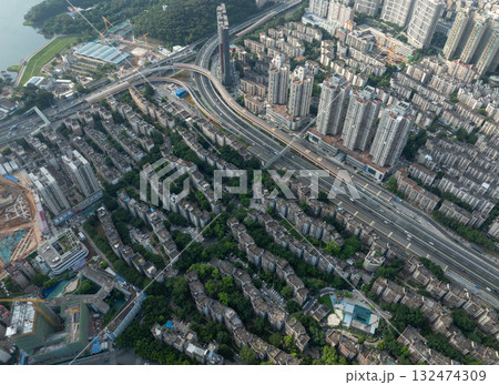 Aerial view of high voltage electric tower in city 132474309