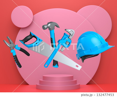 Construction tools and safety equipment floating over podium on abstract background, industrial work and protection concept 132477453
