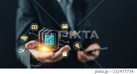 A business professional holds a glowing AI interface by icons for media, search, and documents, symbolizing AI-driven marketing, content creation, and innovative digital automation solutions. 132477734