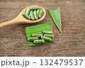 Herbal capsules from green pandan leaf herbal on hand for healthy eating in daily life 132479537