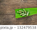 Herbal capsules from green pandan leaf herbal on hand for healthy eating in daily life 132479538