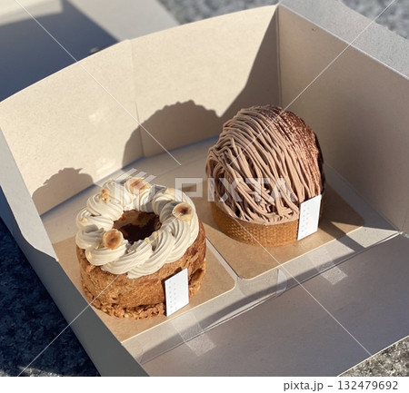 Beautiful and delicious pastries displayed in a bakery, with colorful glazes, delicate toppings, and tempting textures—offering a perfect visual feast of sweetness and artisanal charm. Beautiful and delicious pastries displayed in a bakery, with colorful glazes, delicate toppings, and tempting textures—offering a perfect visual feast of sweetness and artisanal charm. 132479692