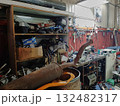 A mess in the workshop, an unorganized garage. 132482317