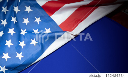 Closeup view of the American flag with colored background. Copy space. American holiday backdrop Closeup view of the American flag with colored background. Copy space. American holiday backdrop 132484284