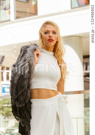 Fashionable woman in city Fashionable woman in city 132486802