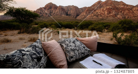 Relaxing safari glamping experience reading and journaling in nature 132487805
