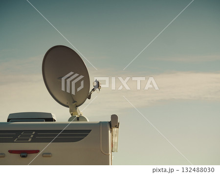 Satellite dish on roof of caravan 132488030