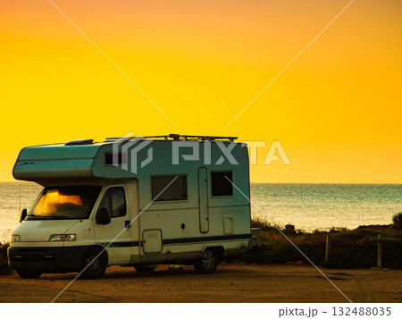 Camper car on beach at sunrise Camper car on beach at sunrise 132488035