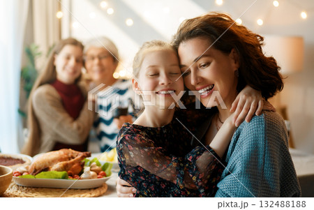 Family celebrating Thanksgiving Day 132488188