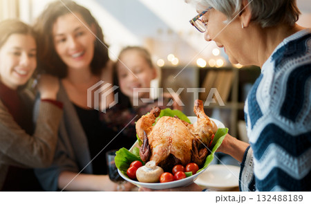 Family celebrating Thanksgiving Day 132488189
