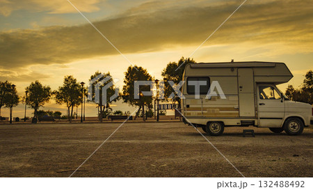 Camper car on beach at evening Camper car on beach at evening 132488492