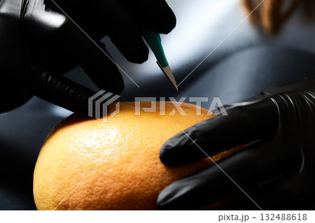 Food testing in the laboratory. The lab technician prepares a sample for microscopic examination. Food testing in the laboratory. The lab technician prepares a sample for microscopic examination. 132488618