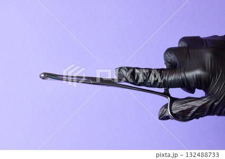 hand-held stainless steel surgical scissors with gloves. hand-held stainless steel surgical scissors with gloves. 132488733