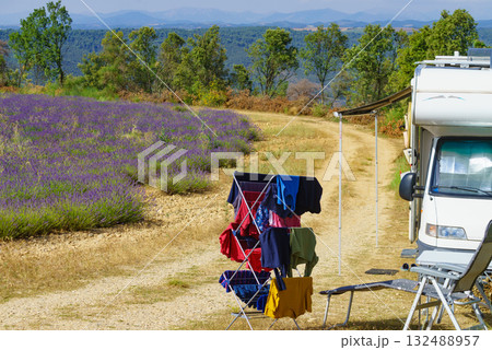 Clothes hanging to dry outdoors by camping car. Caravan vacation in France 132488957