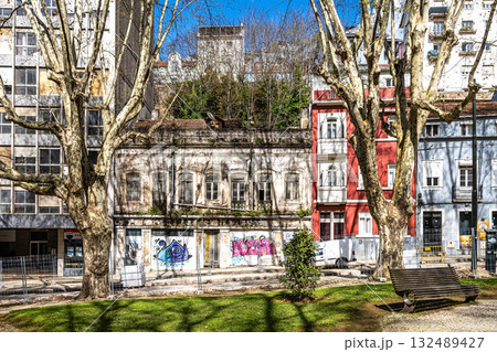 Walking along the streets in historic Coimbra, Portugal's most important university town and old capital. Baixa streets in medieval quarter. 132489427