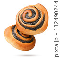 Two poppy seed buns flying on a white background. Isolated 132490244
