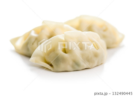 Traditional japanese gyoza dumplings isolated on white background. Traditional japanese gyoza dumplings isolated on white background. 132490445