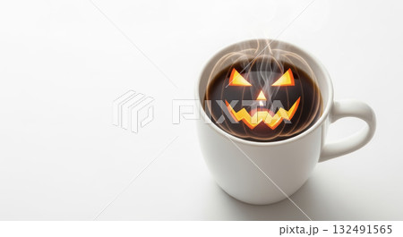 White coffee cup with steaming pumpkin spice latte featuring a carved jack-o'-lantern face, creating a festive autumn atmosphere for seasonal enjoyment and celebration 132491565