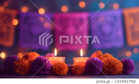 An altar decorated for Dia de Muertos with marigolds and candles. Colorful papel picado banners hang in the background, creating a festive atmosphere. 132492768