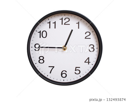 Round wall clock showing 00:45 or 12:45 isolated on white background. Concept of time, punctuality, deadline, or beginning of a new day. Round wall clock showing 00:45 or 12:45 isolated on white background. Concept of time, punctuality, deadline, or beginning of a new day. 132493874