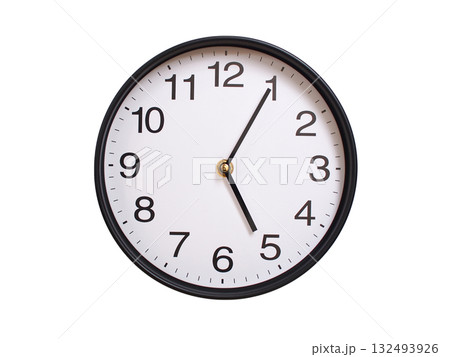 Round wall clock showing 05:05 or 17:05 isolated on white background. Concept of time, punctuality, deadline, or beginning of a new day. Round wall clock showing 05:05 or 17:05 isolated on white background. Concept of time, punctuality, deadline, or beginning of a new day. 132493926