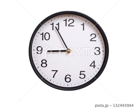 Round wall clock showing 08:55 or 20:55 isolated on white background. Concept of time, punctuality, deadline, or beginning of a new day. 132493984