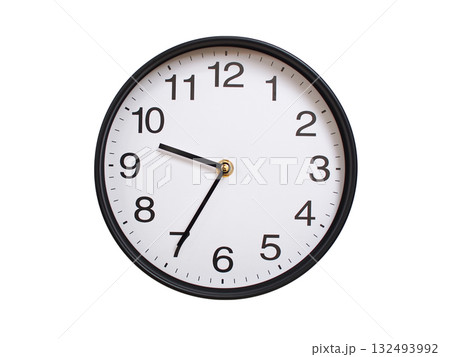 Round wall clock showing 09:35 or 21:35 isolated on white background. Concept of time, punctuality, deadline, or beginning of a new day. 132493992