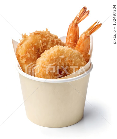 Crispy deep fried shrimp with tails visible served in a pale beige paper cup 132497204