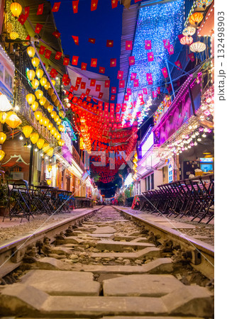 Lively Hanoi Train Street Cafes at Night 132498903