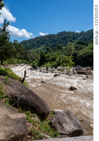 Mae Taeng River Flowing Through Mountain Valley, Chiang Mai, Vertical 132501053