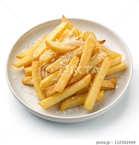 Golden french fries lightly dusted with white seasoning served on a white plate 132502409